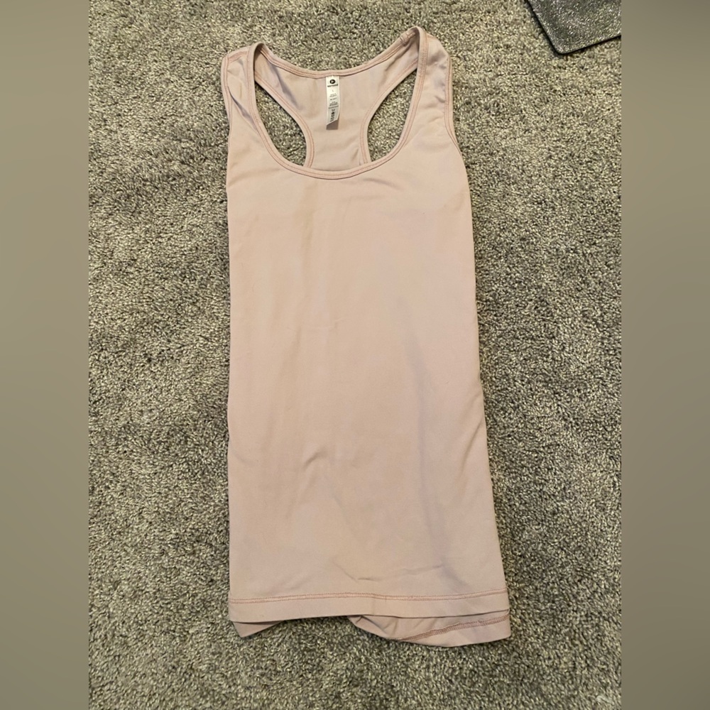 Exercise tank top. Size Large. Very pale pink. Racerback.